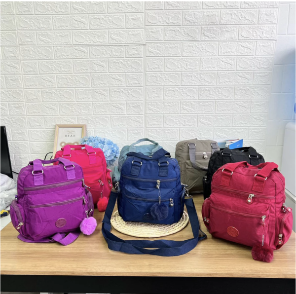 Bolsa Mochila Feminina Impermeavel Nylon Transversal De Mao